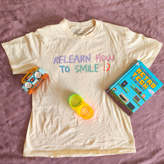 Relearn How To Smile Tee